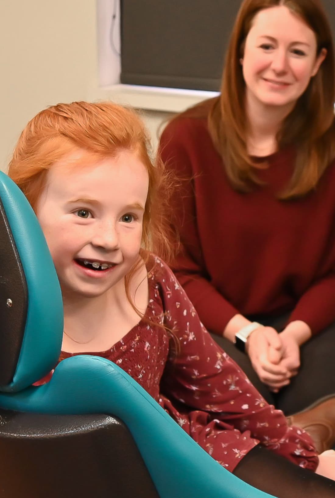 young girl smiling during appointment